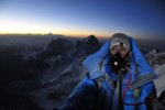 Peter Whittaker climbs towards the summit of Mt. Everest as a new day greets Nepal.