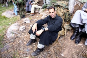 Fr. Duverge', a Benedictine monk and priest from France, and a woodsman who helped evaluate the Rendezous Peak watch on a 20-mile hike using only compass and topo map.