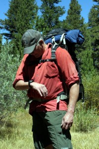 Keep wrist horizontal for accurate compass readings. Backpack is Lowe-Alpine FTX Cerro Torre 65:85.