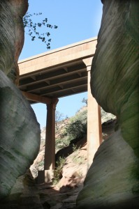 The canyon loops back east to end up just under the bridge that leads into the tunnel.