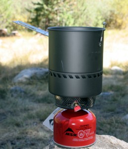 The MSR Reactor stove stores in its 1.7 liter pot. The only disadvantage is that you can't use it with any other type of pan. 