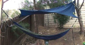 Eagles Nest two-person hammock with rainfly and its semi-permanent location in the back yard.