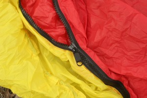 The heavy duty zipper on the side of the Brooks-Range bivy makes it easy to enter and exit. 