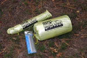 Shown are the A2 tent in its small stuff sack, alumimum poles and aluminum stakes in their own sack. 