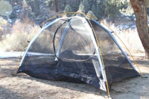 The tent is light due to its no-see-um mesh sides and light aluminum poles. 